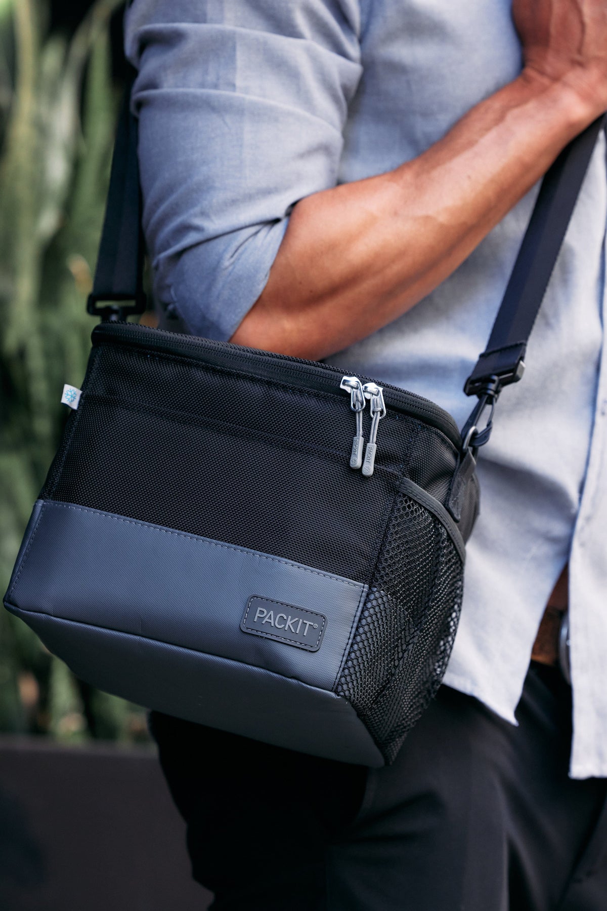 freezable-lunch-pail-s9 freezable-upright-lunch-pail-black-gray-lifestyle-male-city.jpg